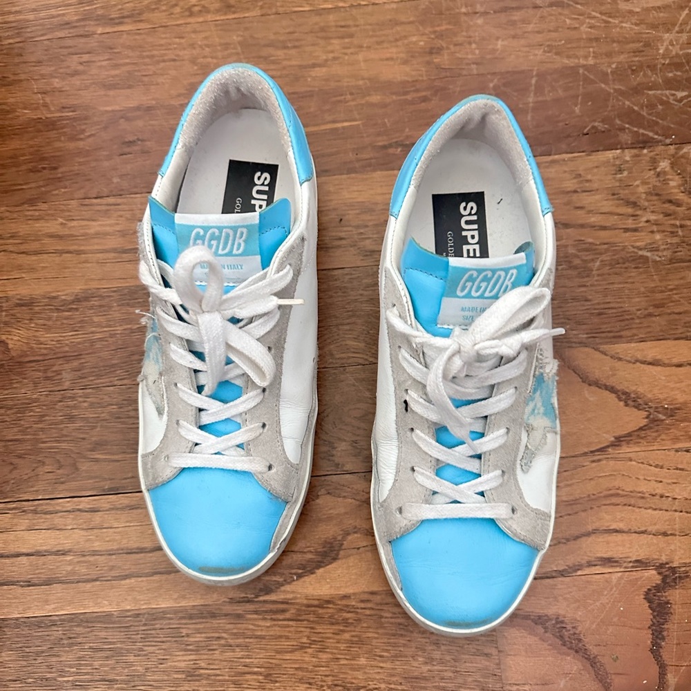 Golden goose superstar float on sneakers